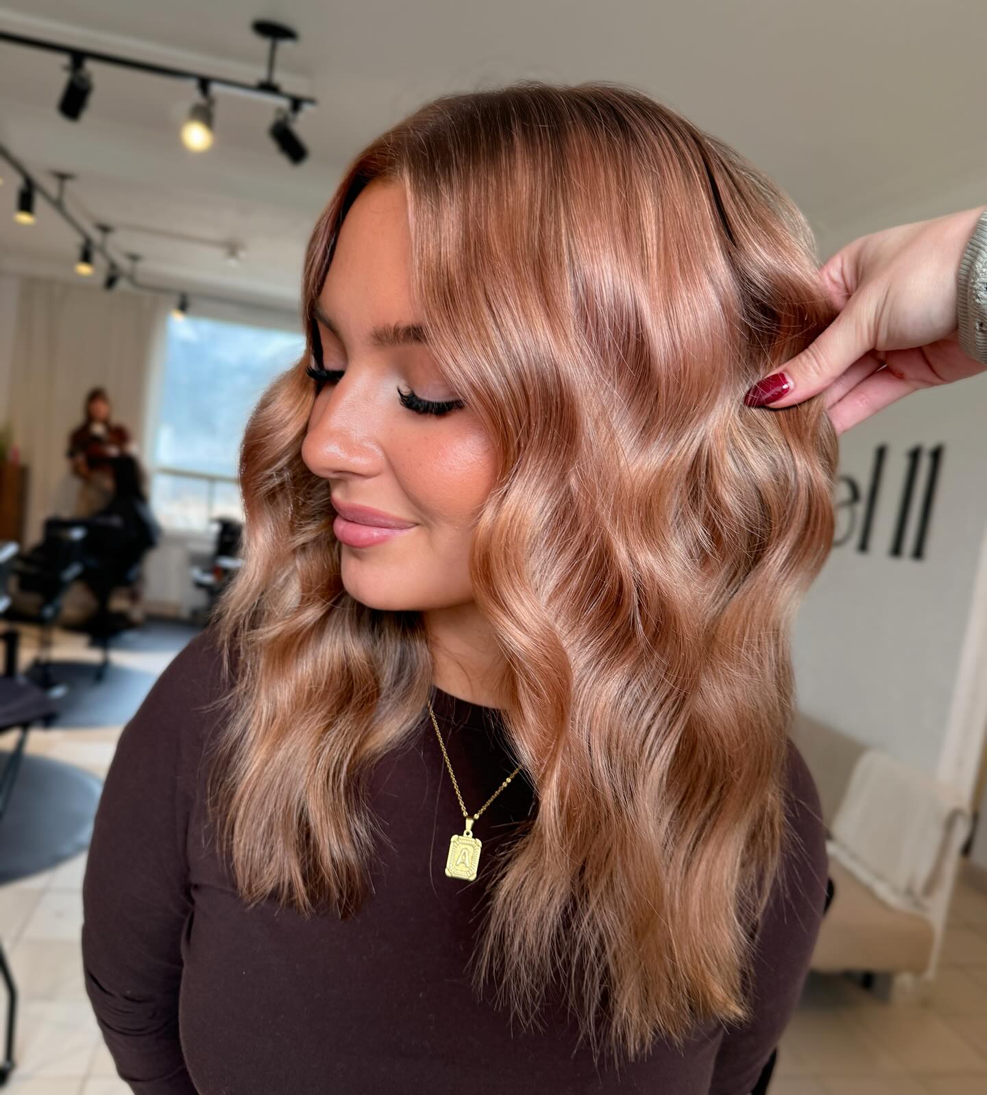 Rose Gold Waves With Face-Framing Layers