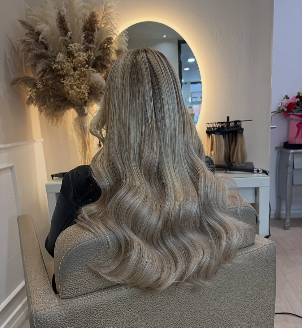 Champagne Blonde Waves With Face-Framing Layers