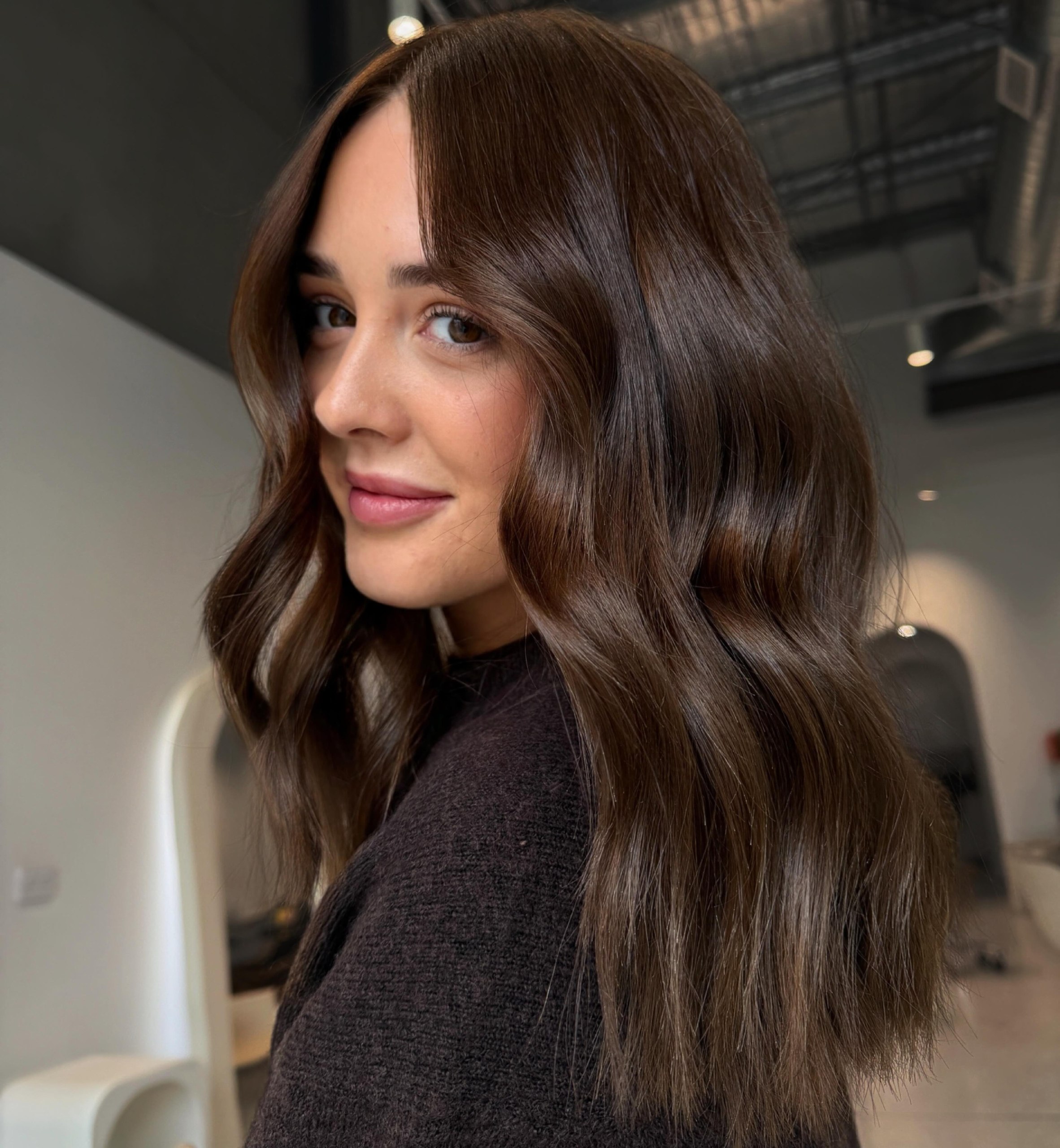 Deep Chocolate Brown Waves With Face-Framing Layers