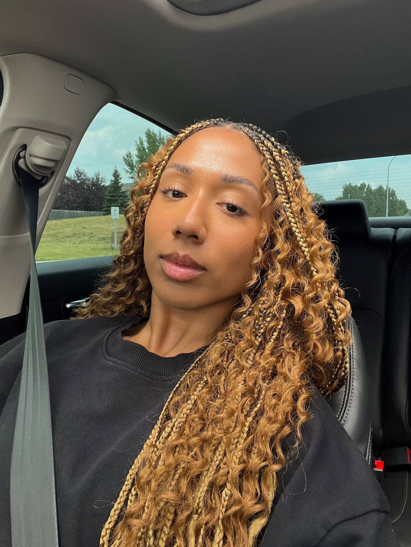 Golden Honey Mixed Braids With Defined Curls