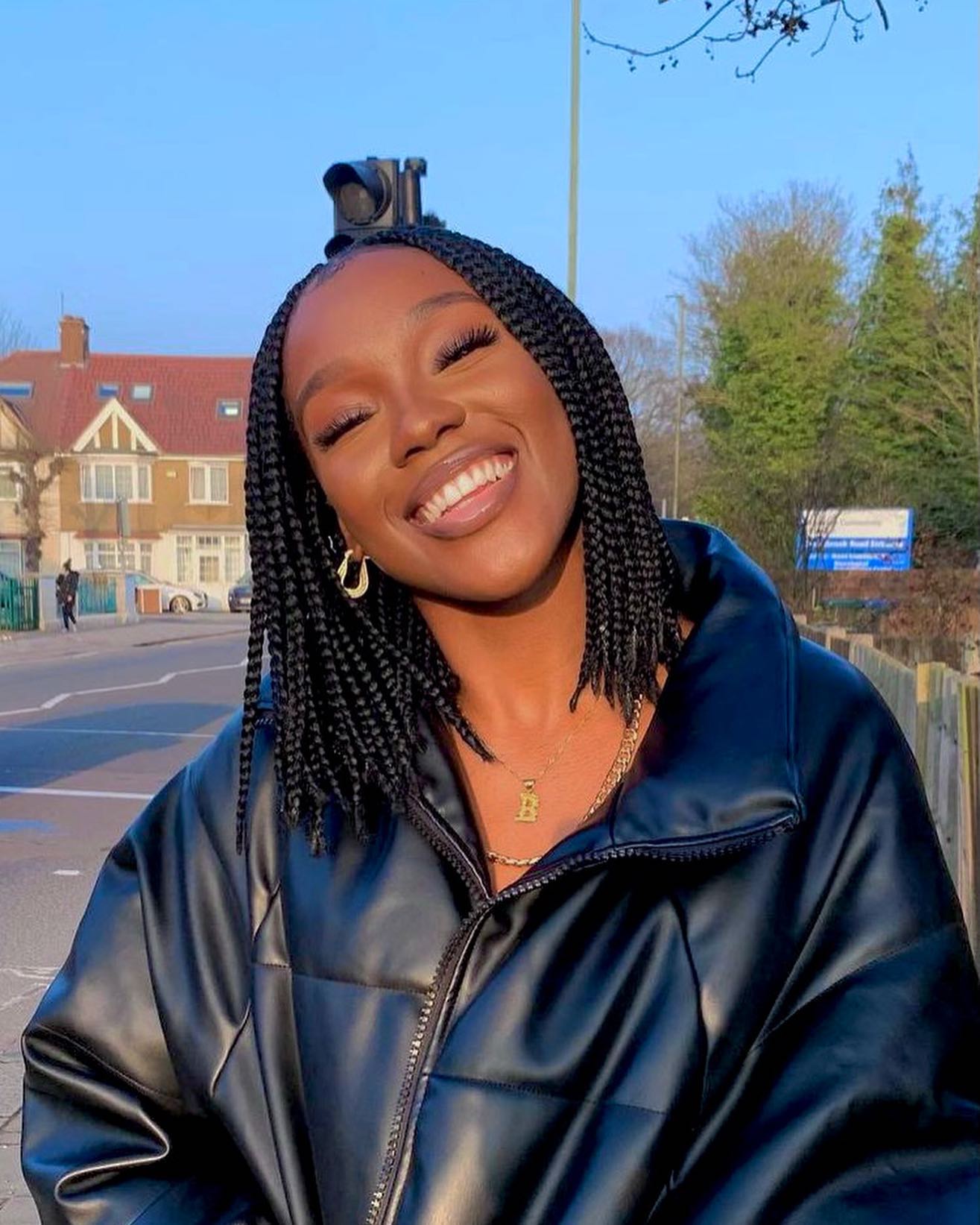 Sleek Shoulder-Length Box Braids With Subtle Layers