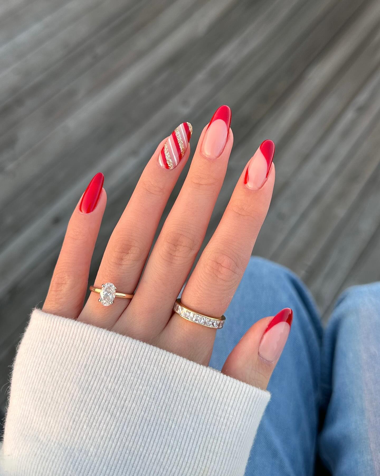 Candy Cane French Tip Almond Nails with Gold Glitter