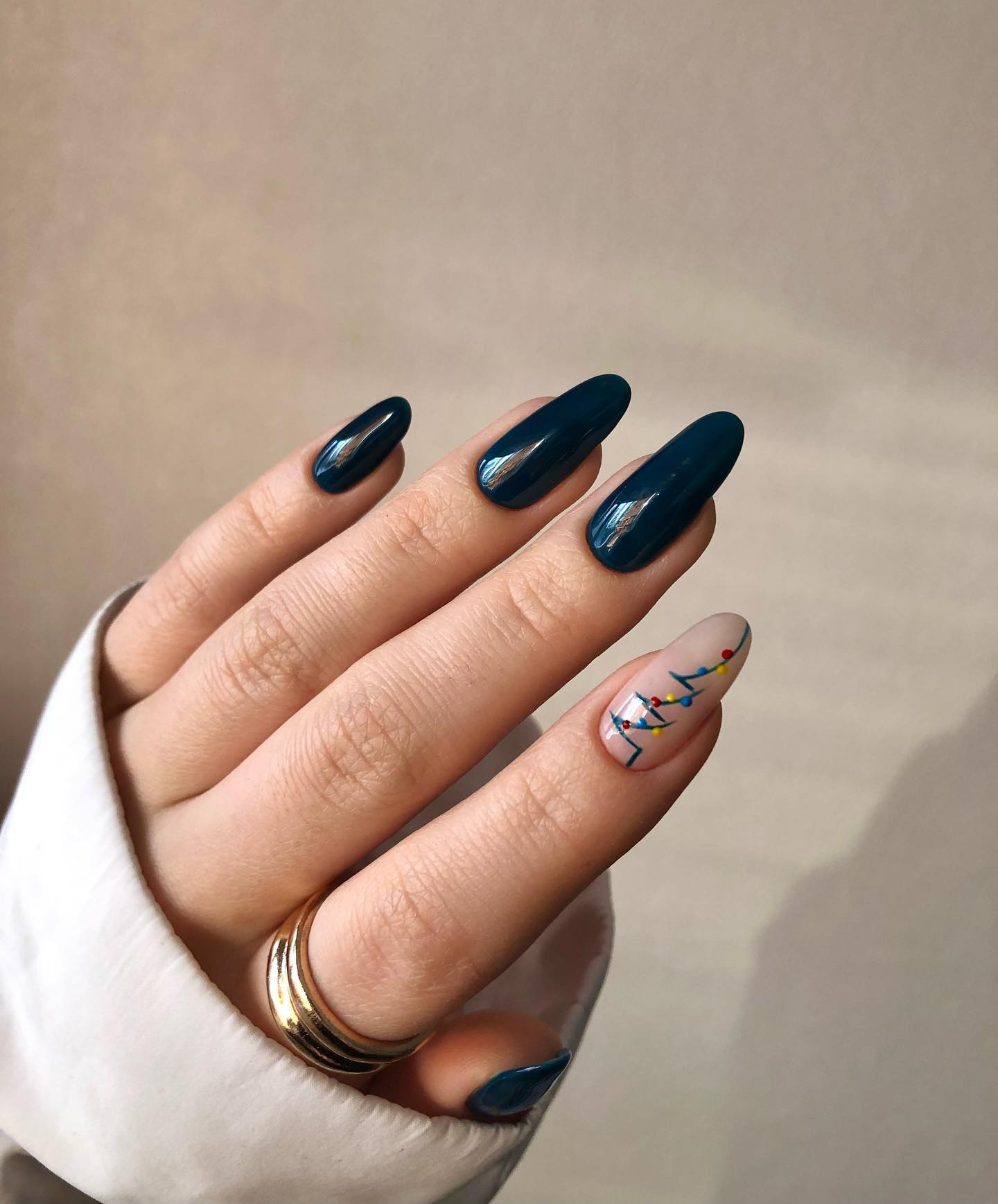 Deep Teal Oval Nails with Christmas Lights Accent
