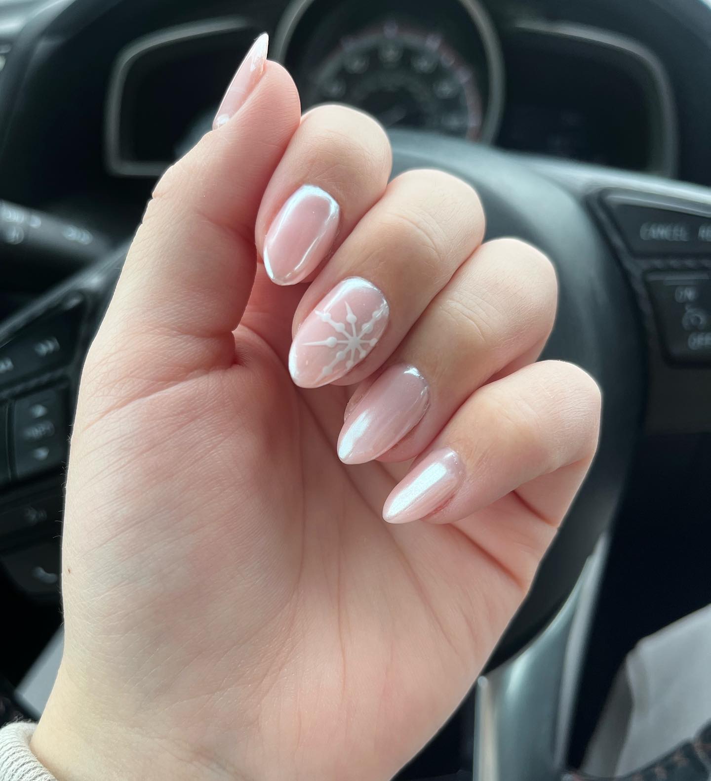 Pale Pink Almond Nails with Snowflake Art