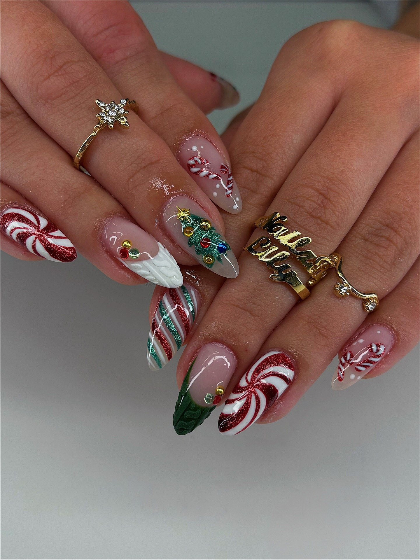 Festive Christmas Candy Cane Almond Nails