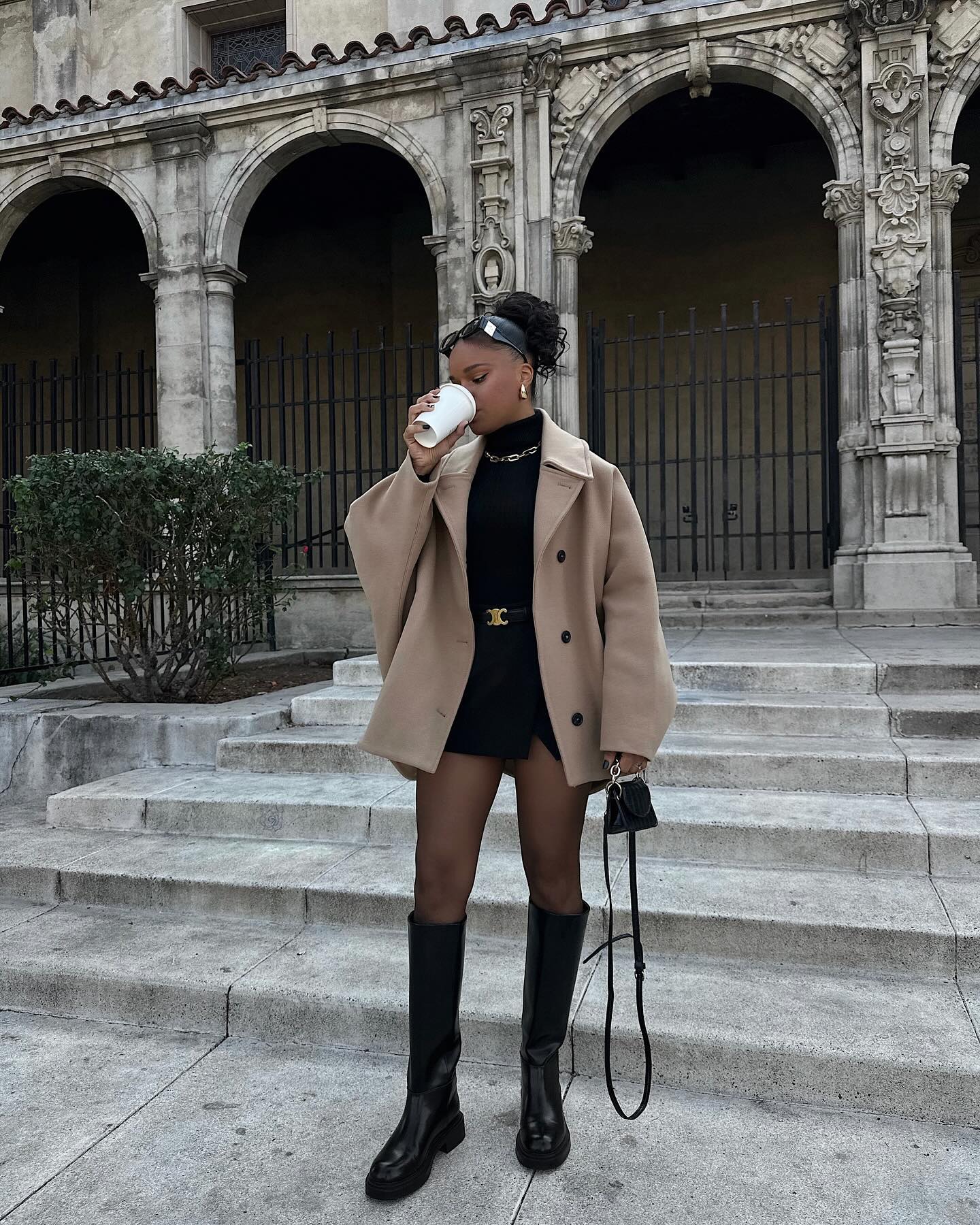 Camel Cape Coat And Black Knee High Boots