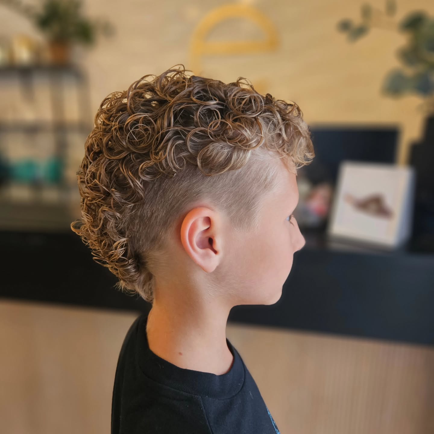 Textured Curly Mohawk With Fade