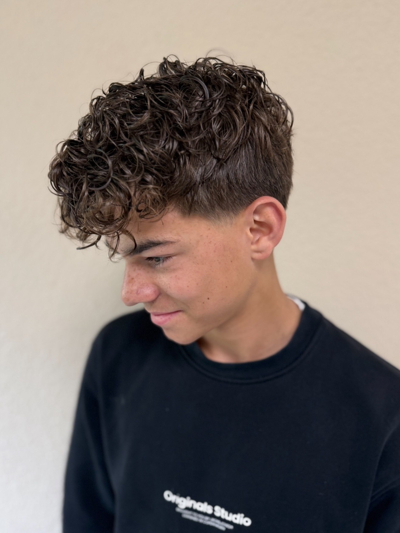 Textured Curls With A Sharp Fade