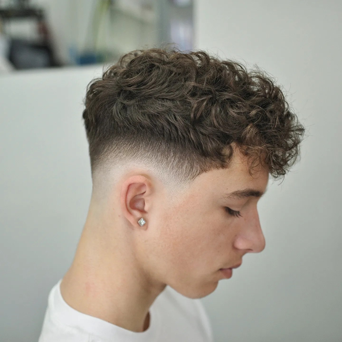 Textured Curls With a Sharp Fade
