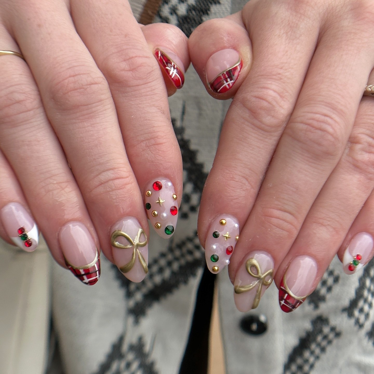 Festive Plaid and Rhinestone Holiday Almond Nails