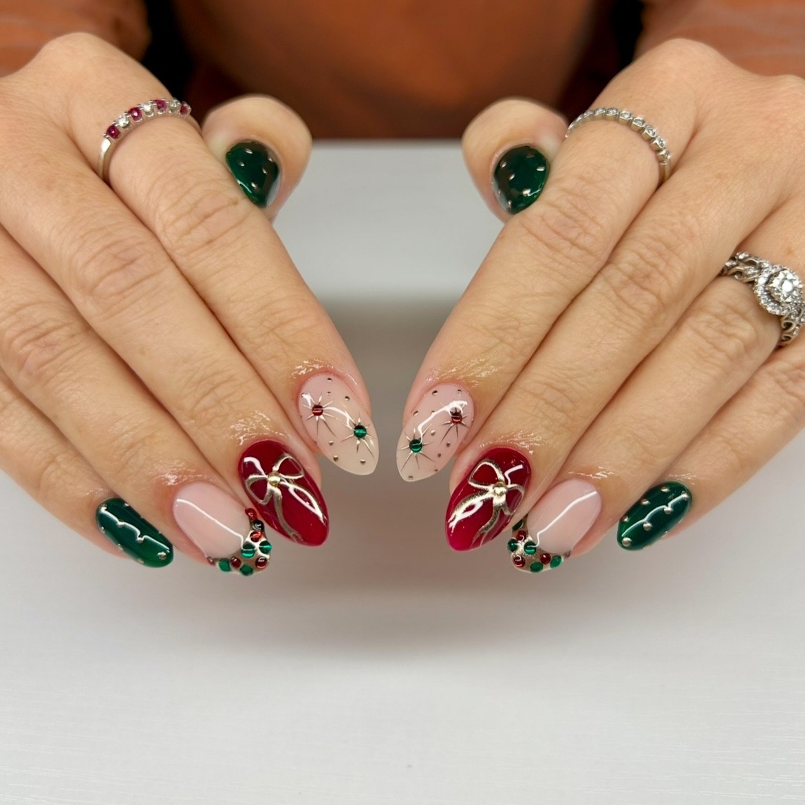 Festive Red And Green Almond Christmas Lights Nails