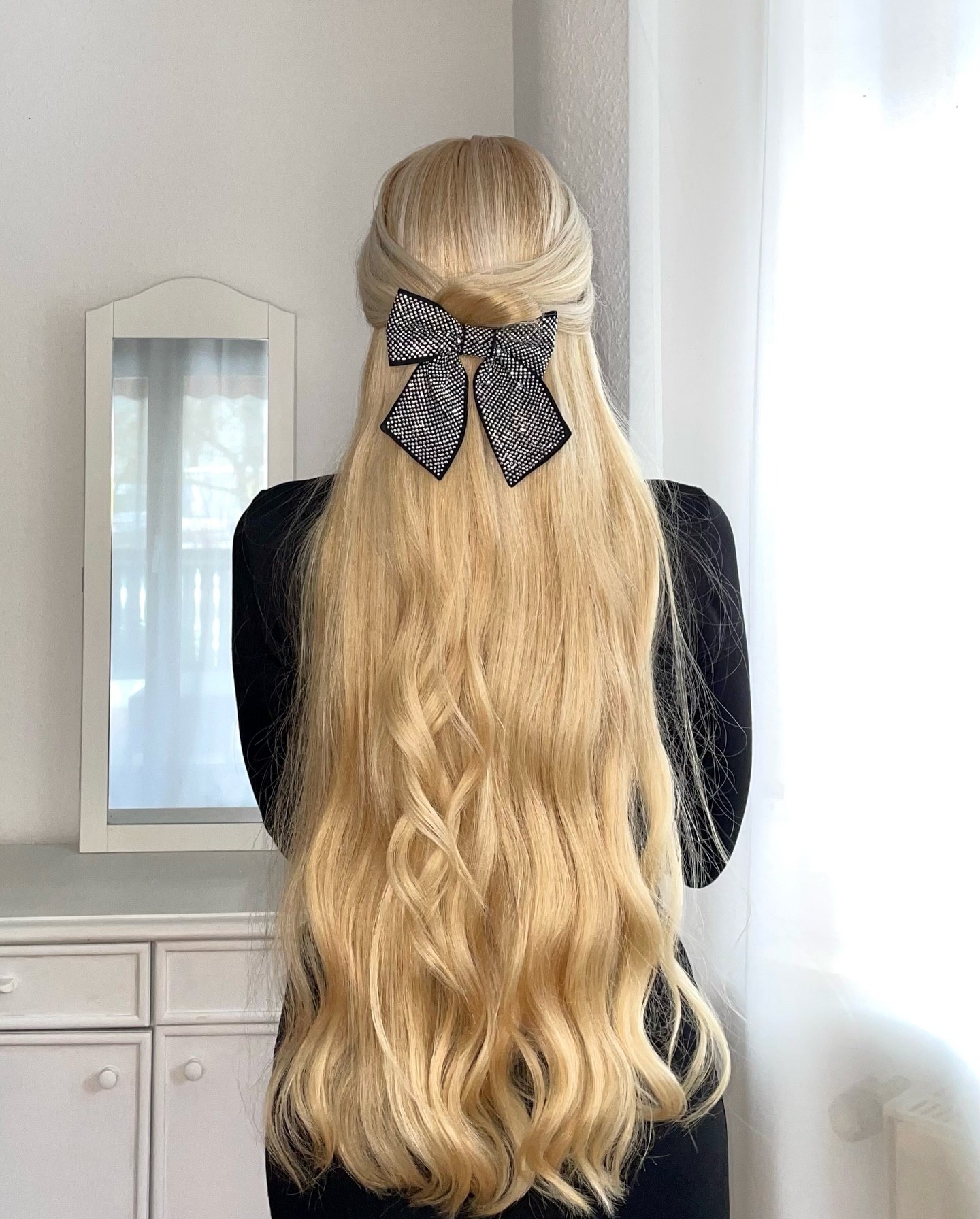 Blonde Half-Up Waves With Sparkling Bow Accent