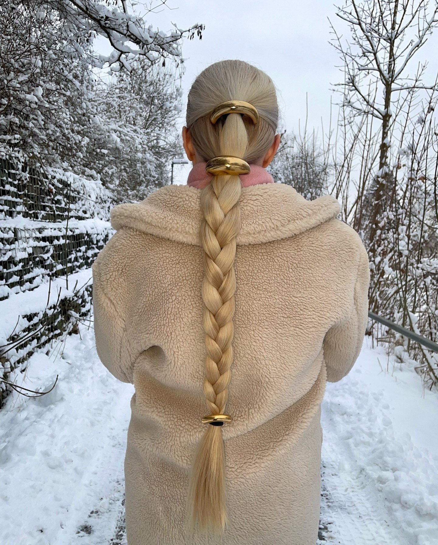 Chic Braided Ponytail With Gold Hair Rings