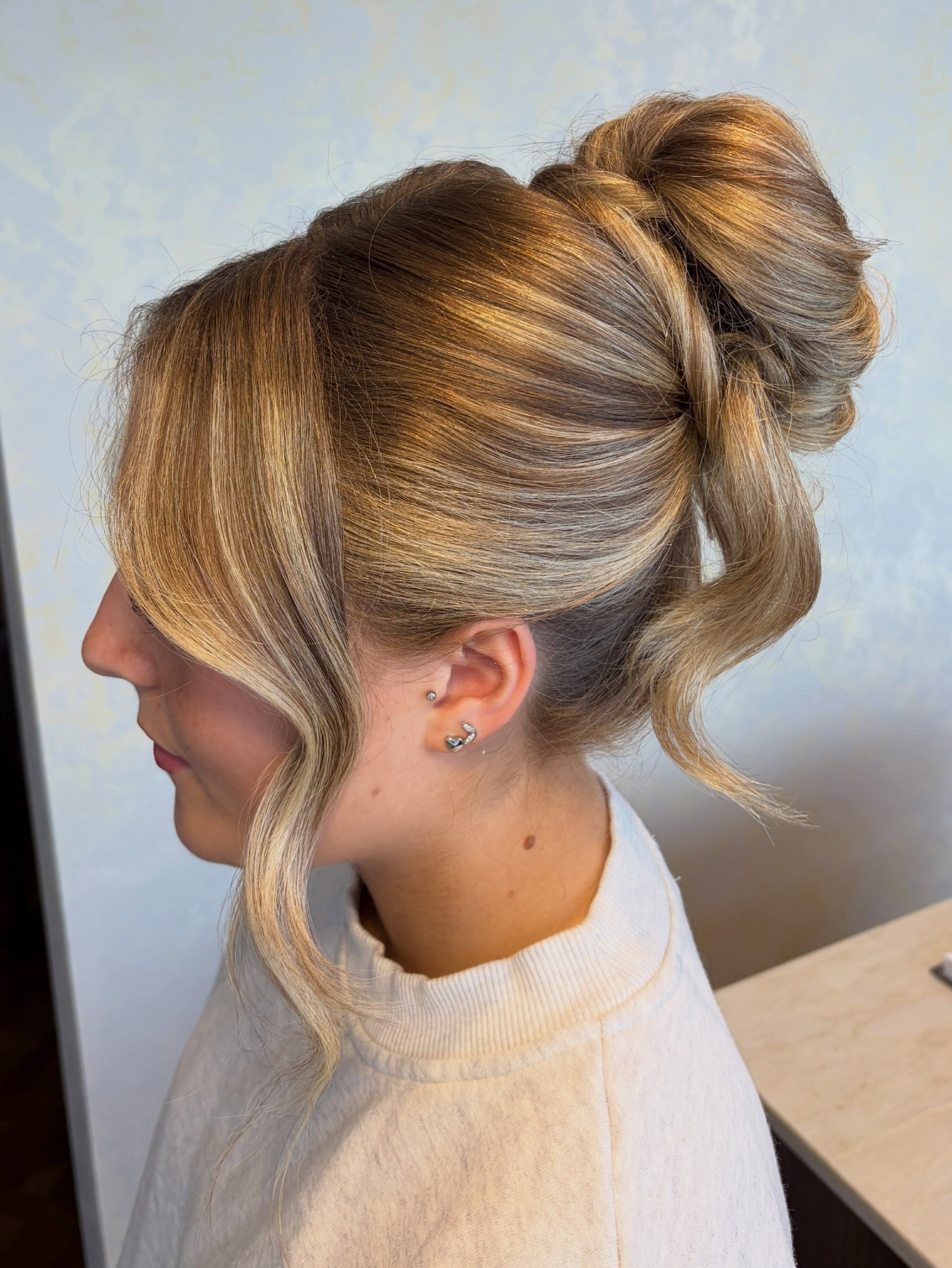 Effortless Chignon With Wispy Face-Framing Strands