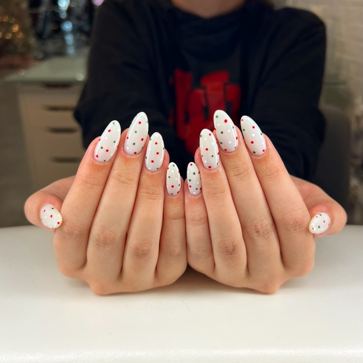 Milky White Polka Dot Almond Christmas Nails