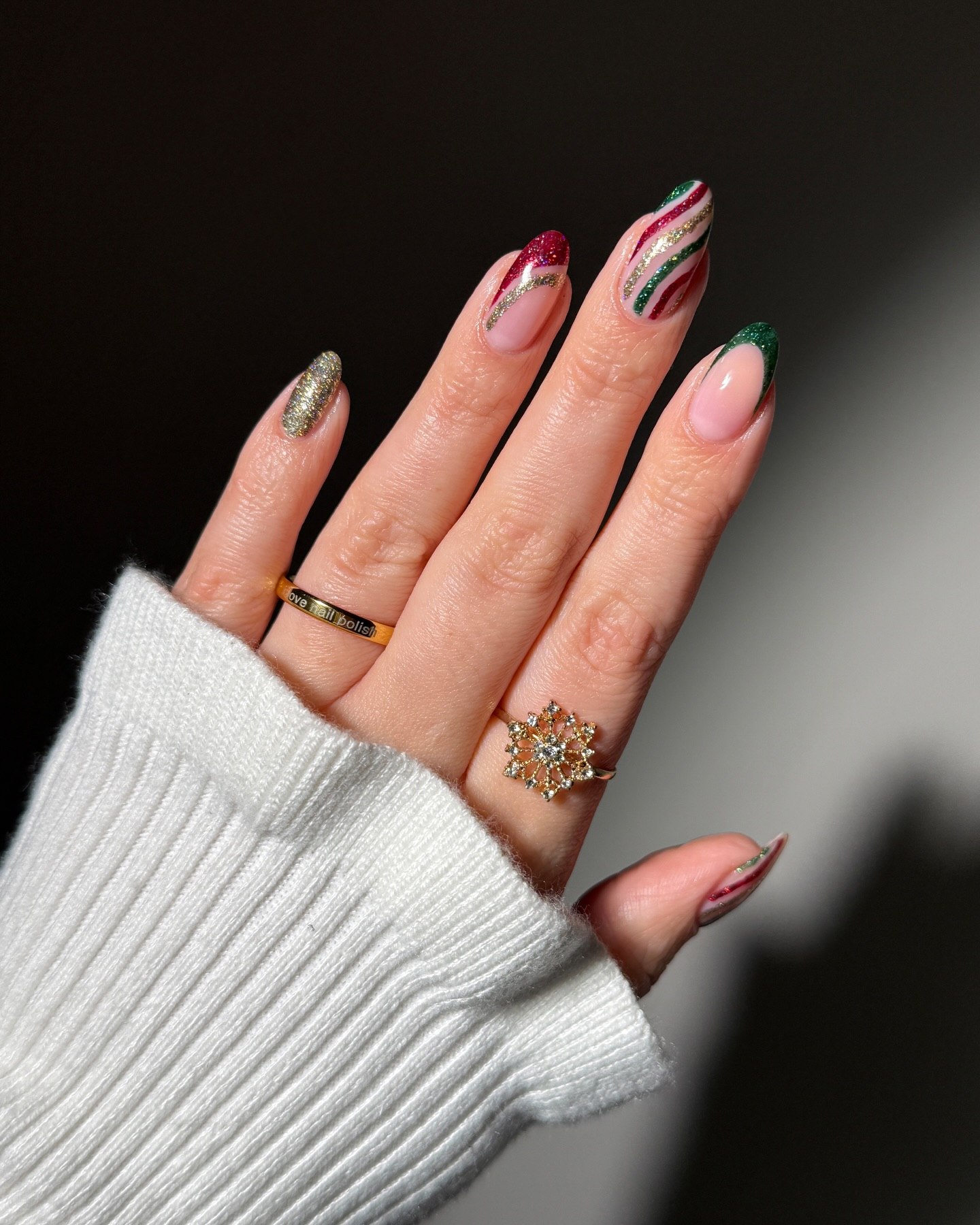 Glittering Candy Cane French Tips with Gold Accents