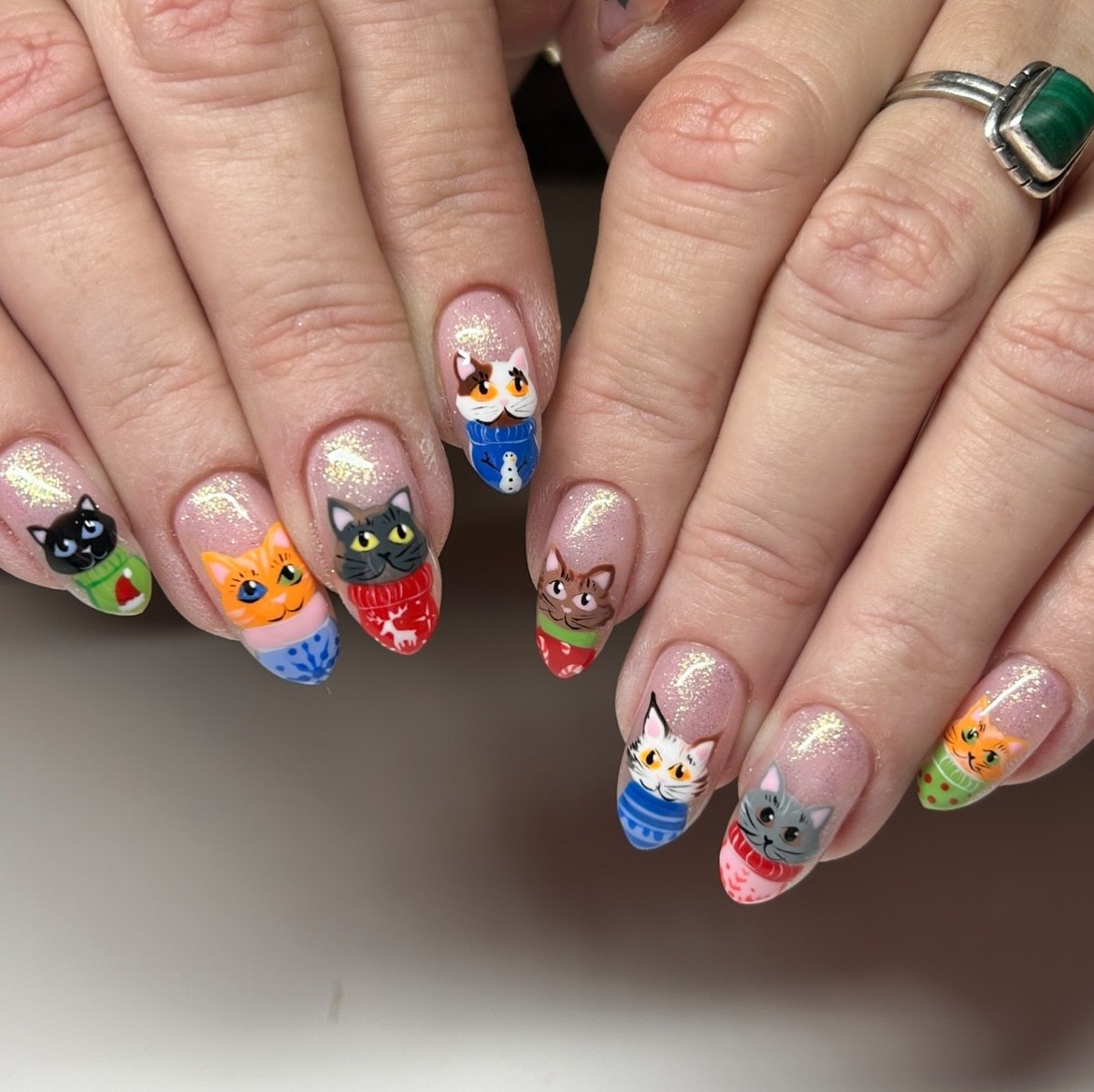 Cozy Christmas Cats in Sweaters Nail Art