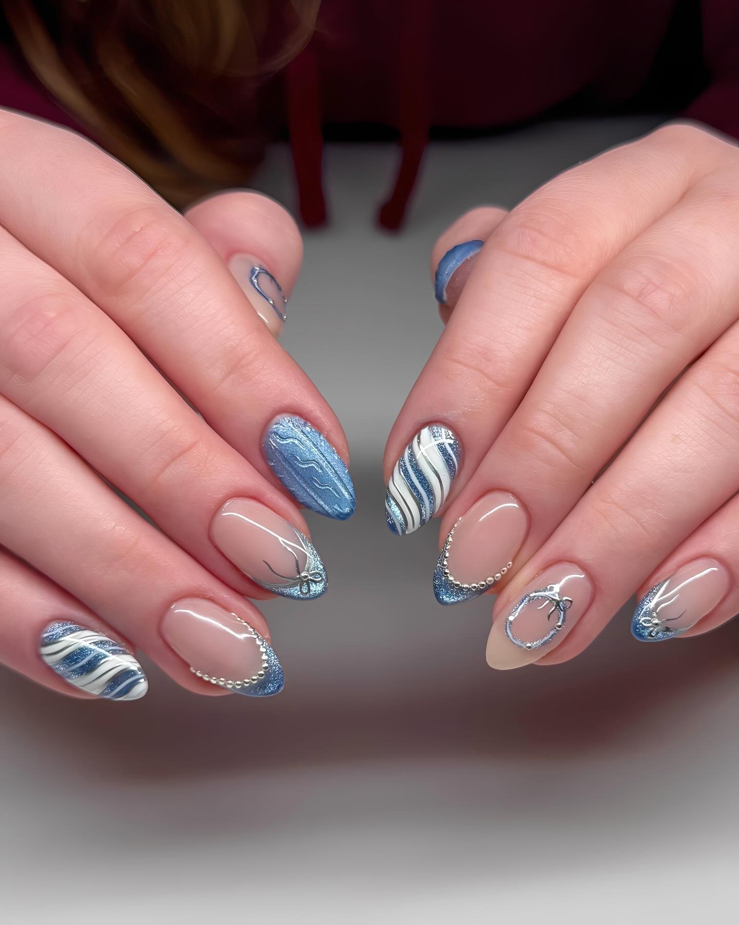Sparkling Blue Winter Wonderland Almond Nails