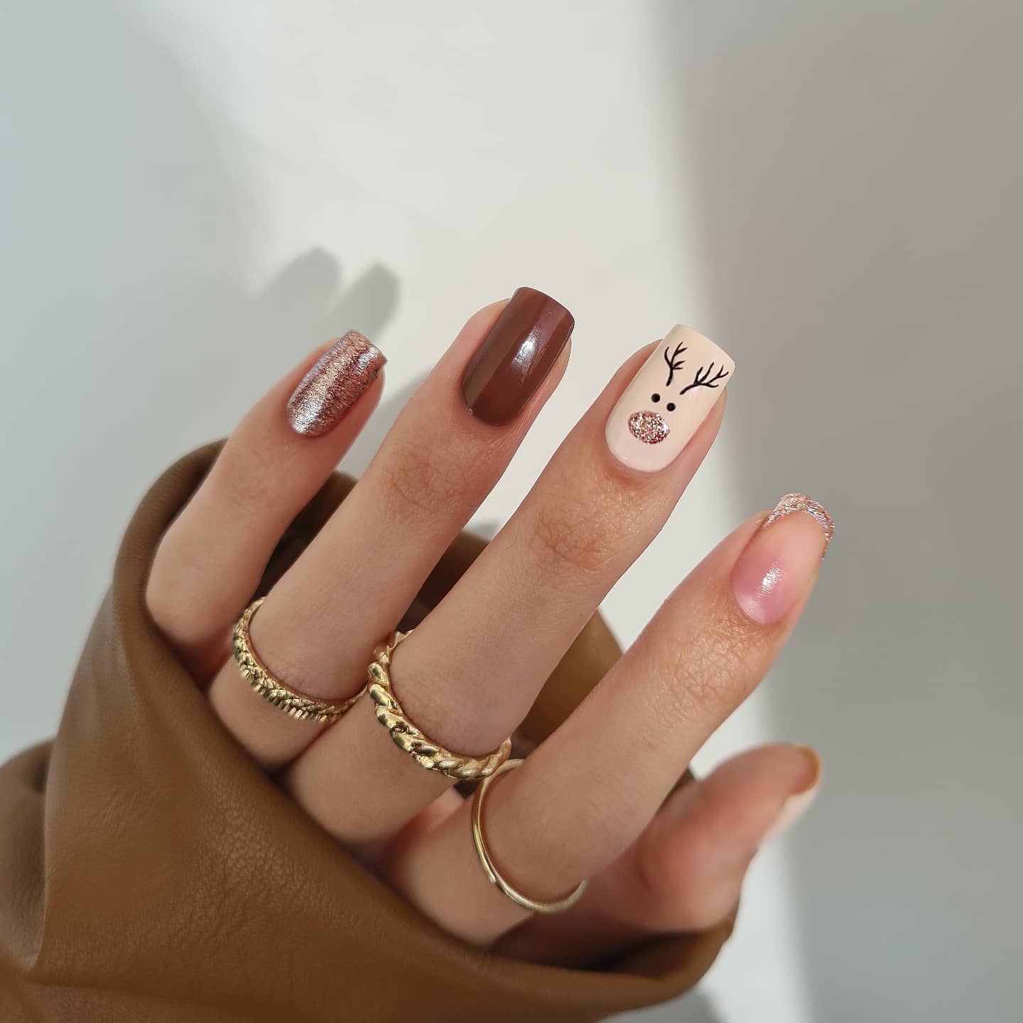 Subtle Reindeer & Glitter Christmas Nails