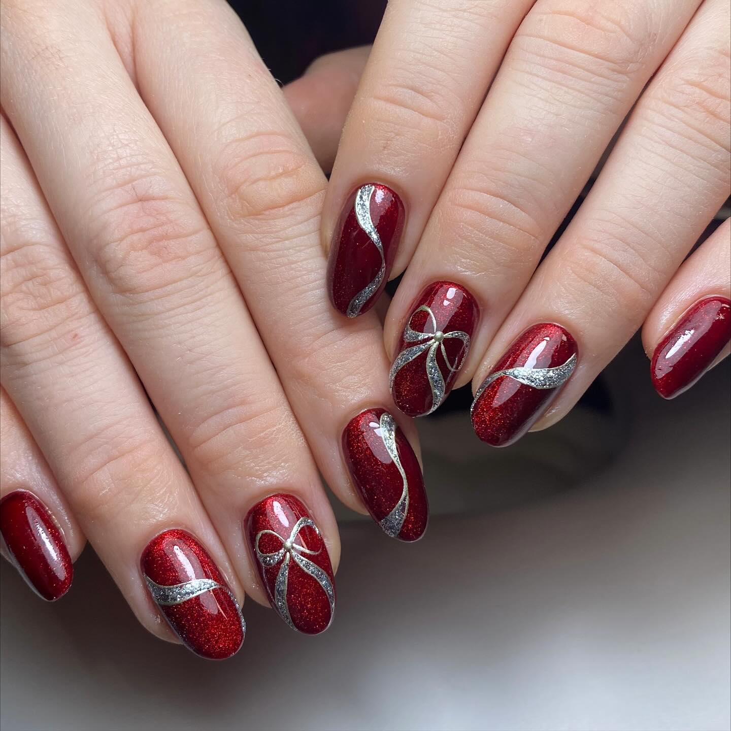 Glittering Ruby Red Bow Nails