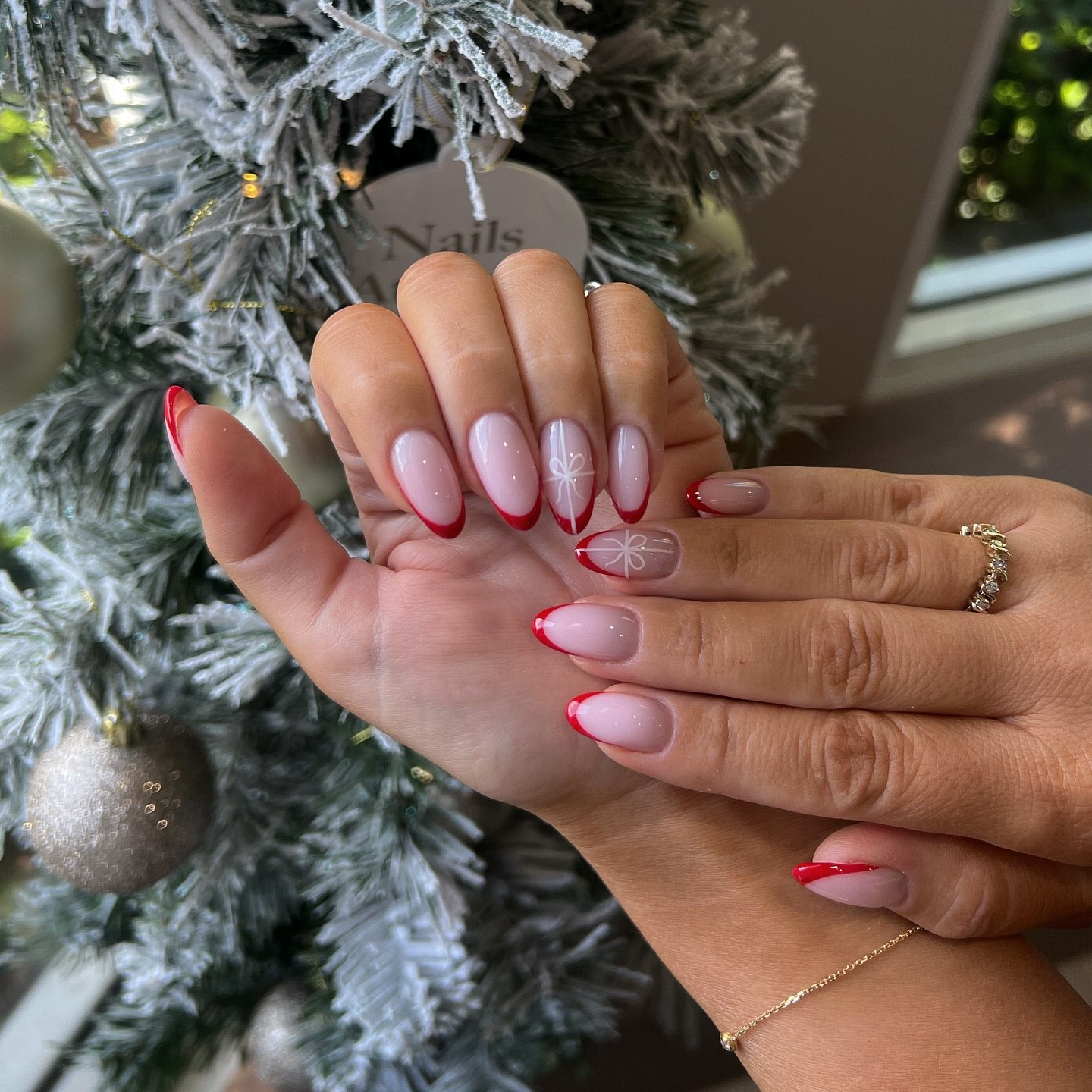 Festive Red French Tip Bow Accent Nails