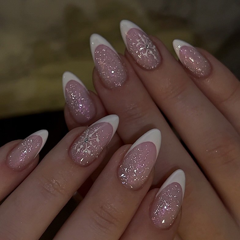 Sparkling Snowflake French Tip Almond Nails