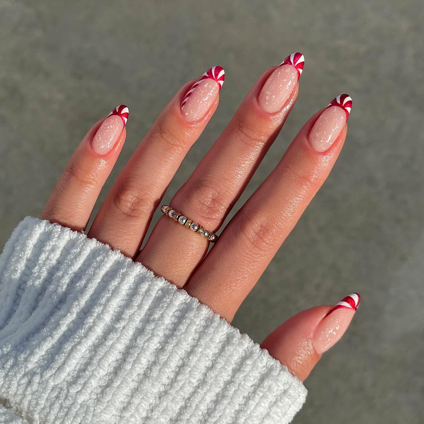 Candy Cane Swirl French Tip Almond Nails