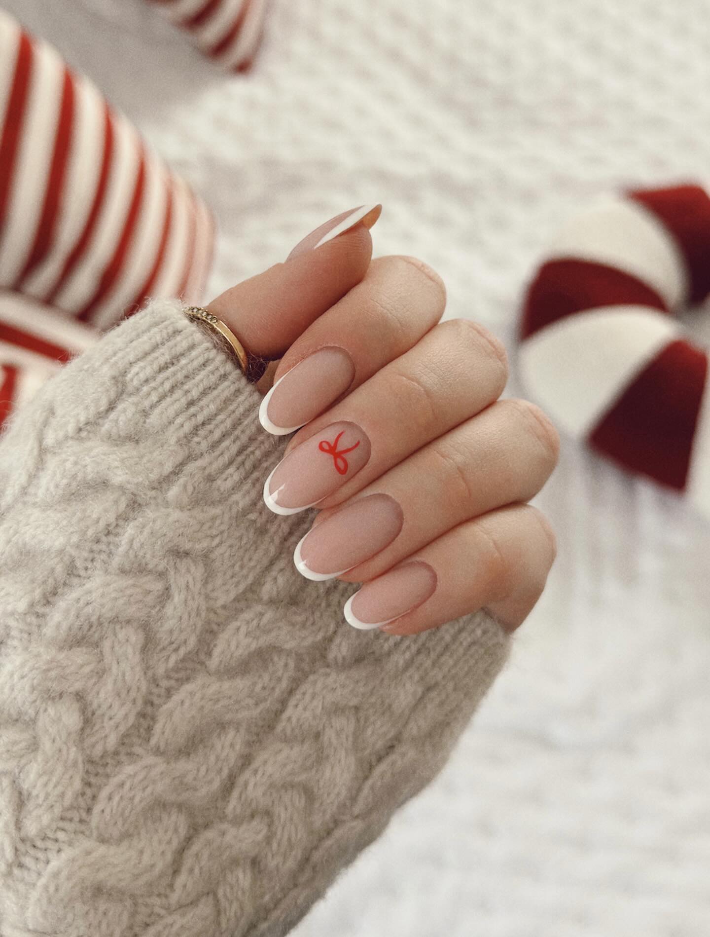 Classic French Tip with Red Bow Accent