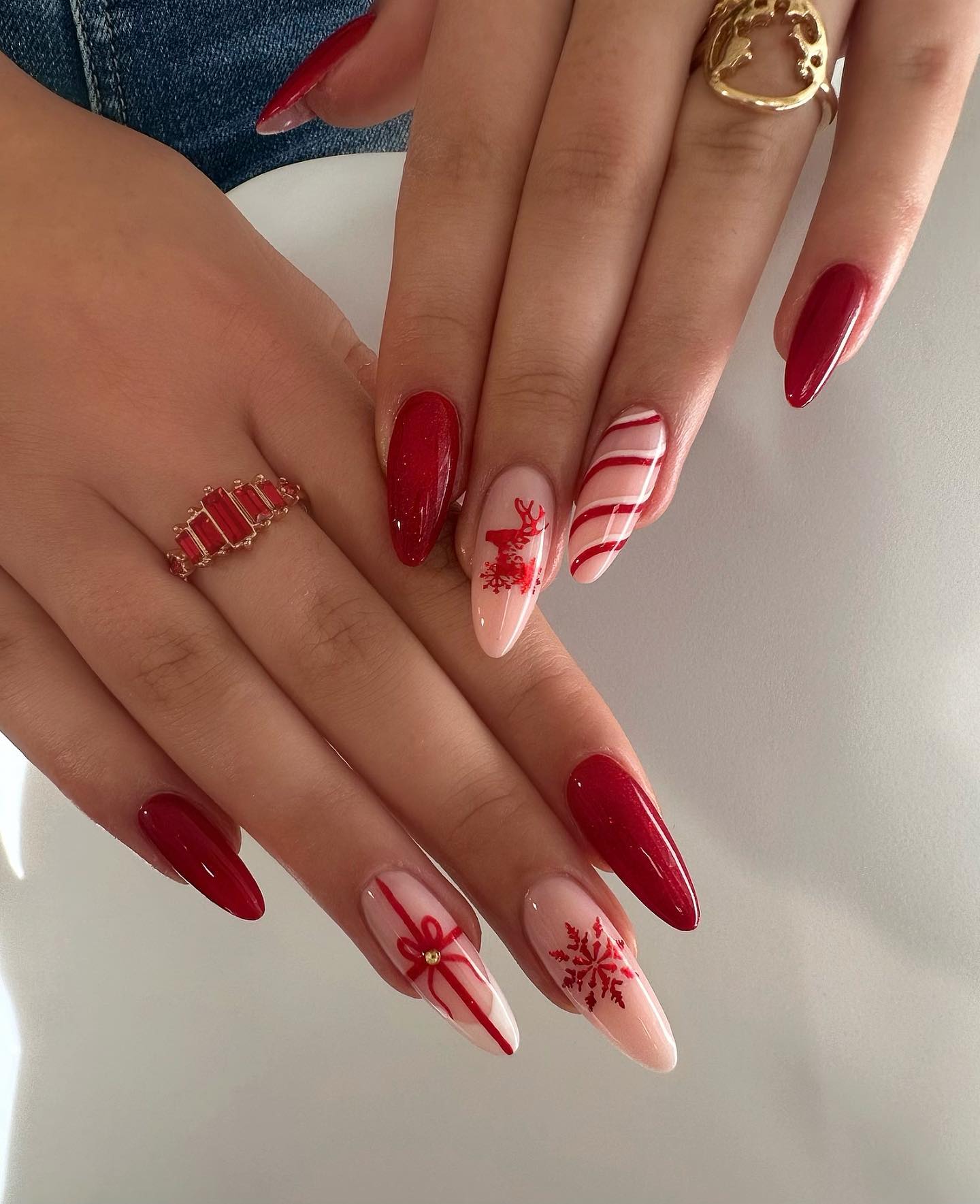 Festive Red Candy Cane Almond Nails