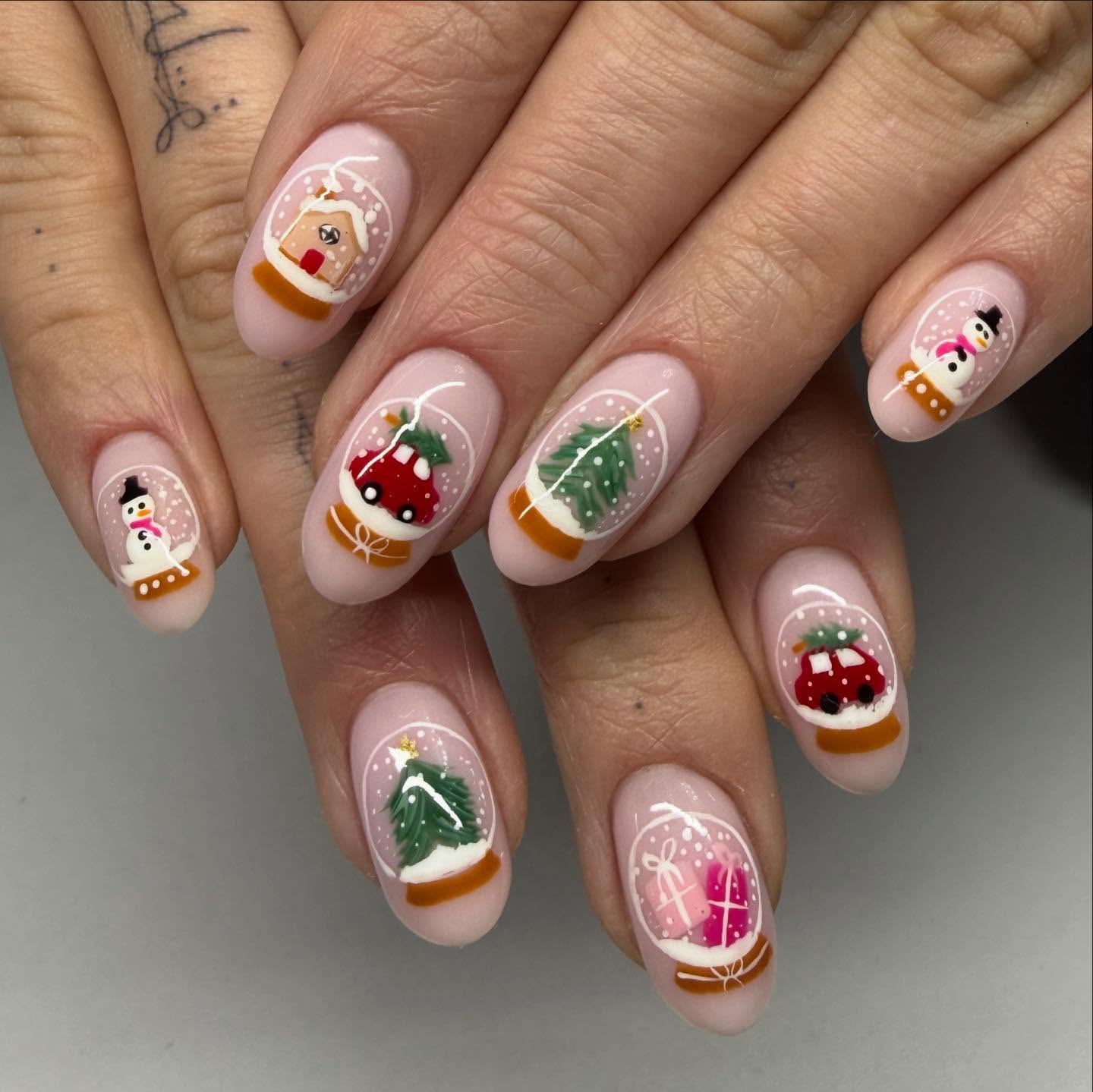 Festive Snow Globe Christmas Nail Art