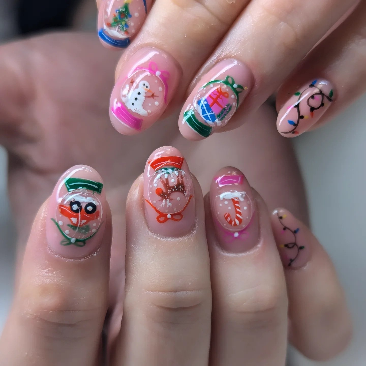 Enchanting Snow Globe Christmas Nail Art