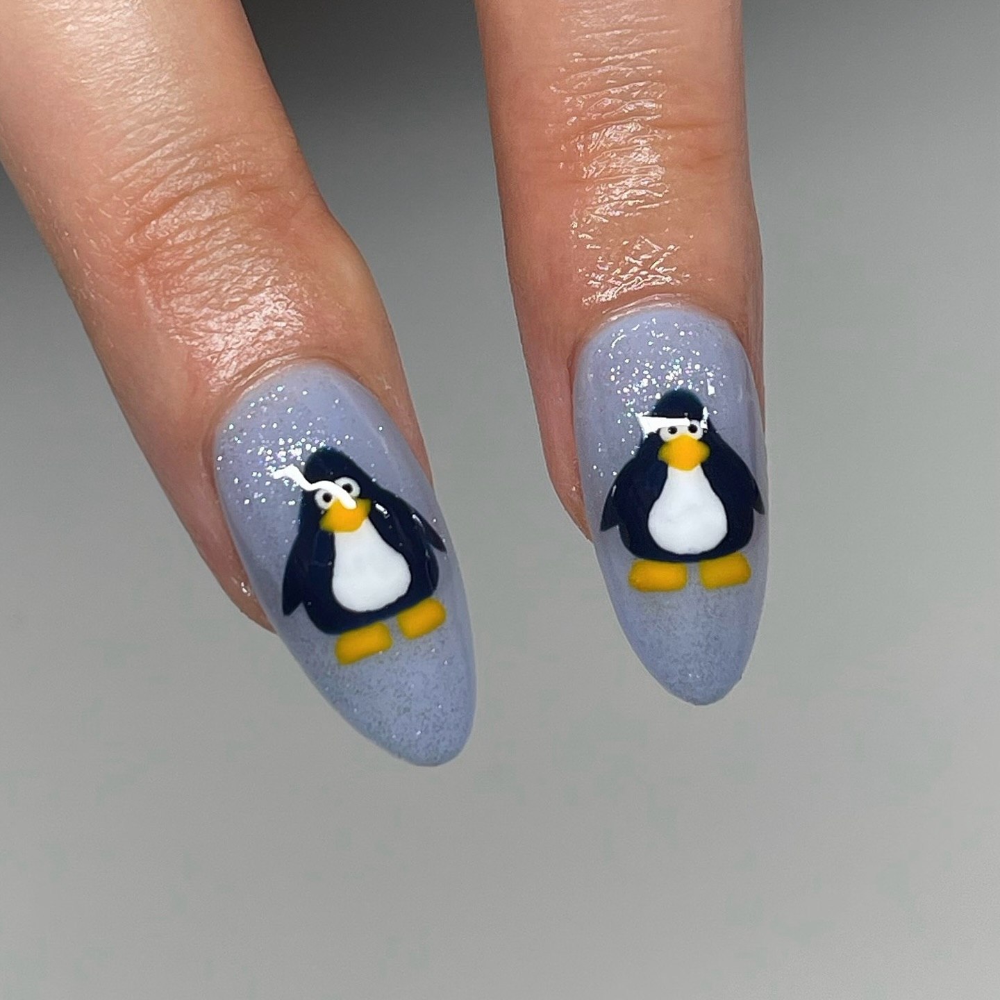 Playful Penguin Winter Glitter Nails