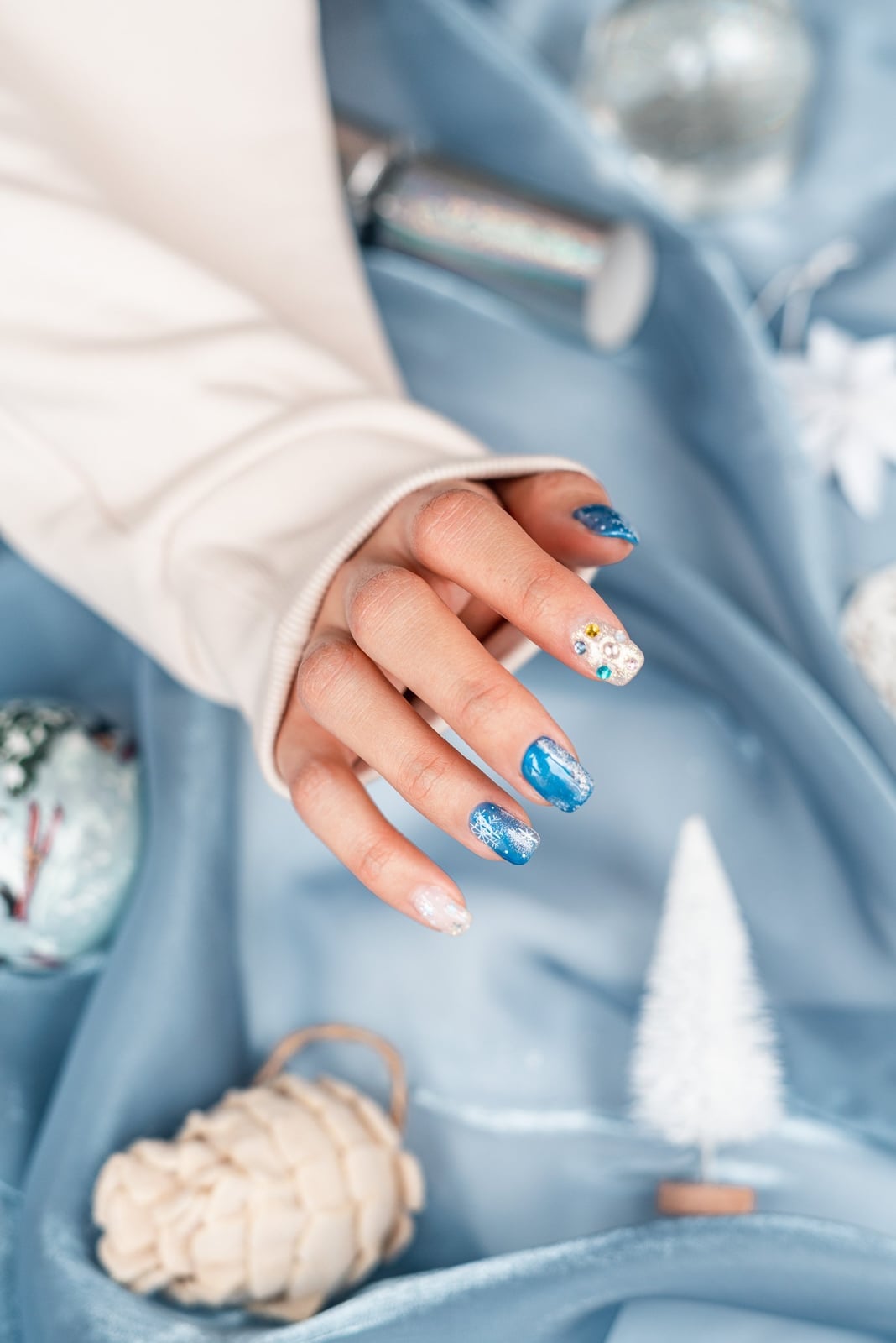 Short Square Blue Glitter Snowflake Rhinestone Nails, Close-Up Take Short Square Blue Glitter Snowflake Rhinestone Nails, Close-Up Take — Winter Wonderland Nails