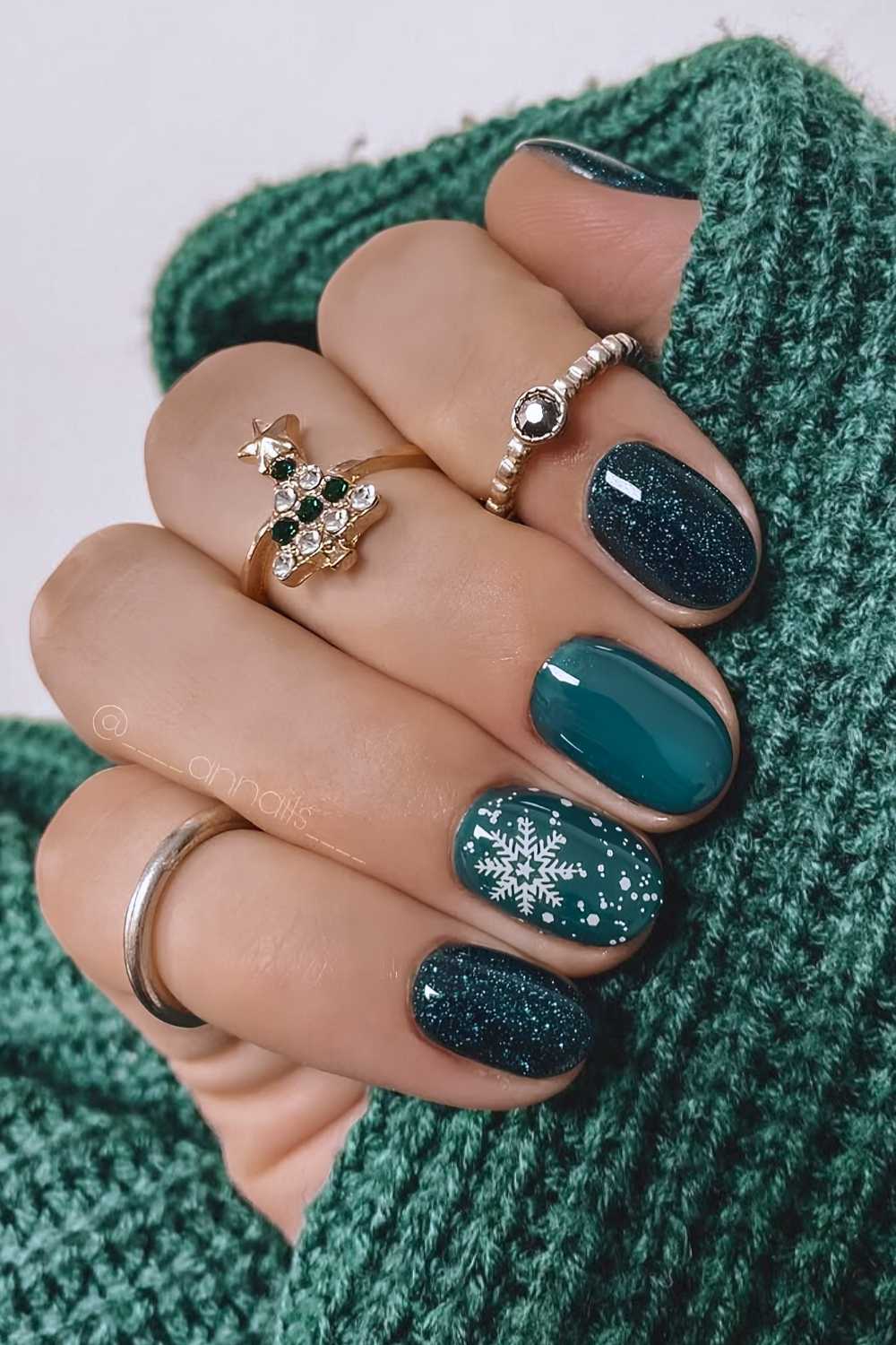 Short Oval Teal and Navy Glitter with Snowflake — Dark Green Christmas Nails