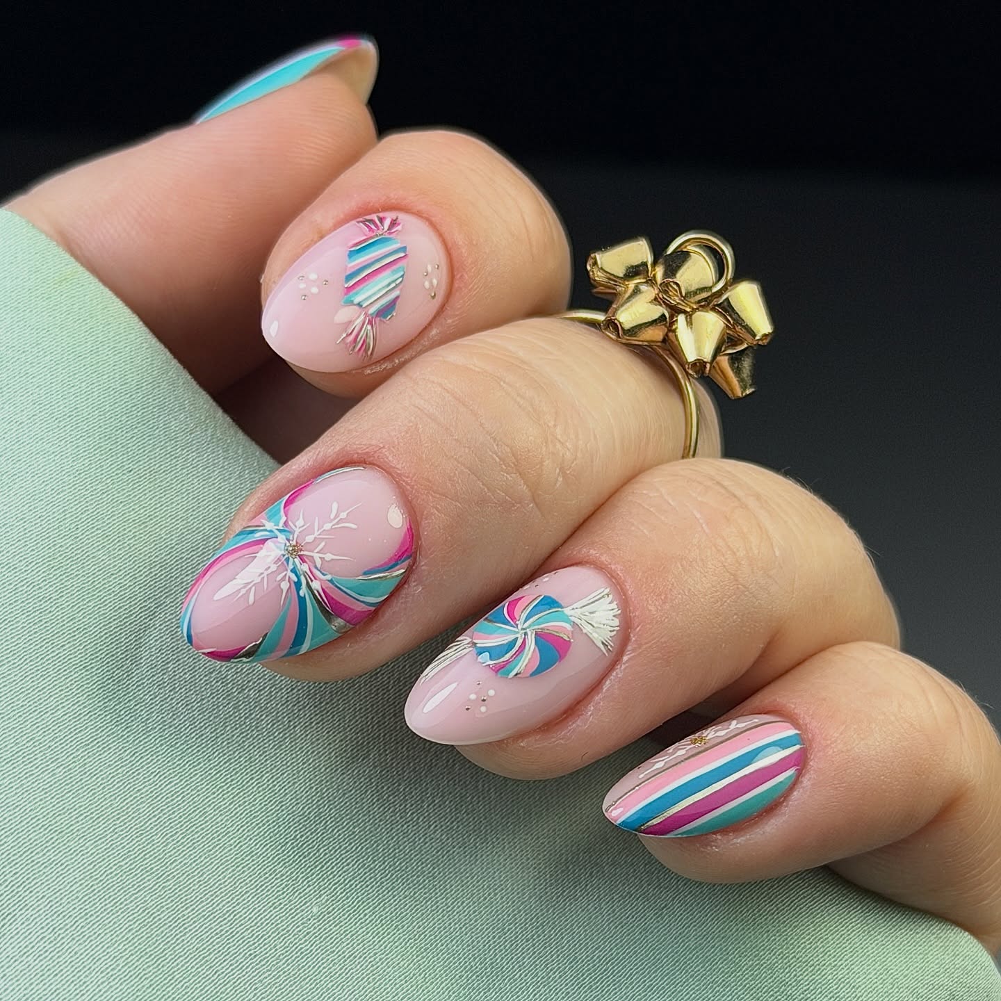 Pink Candy Cane Swirl Almond Nails