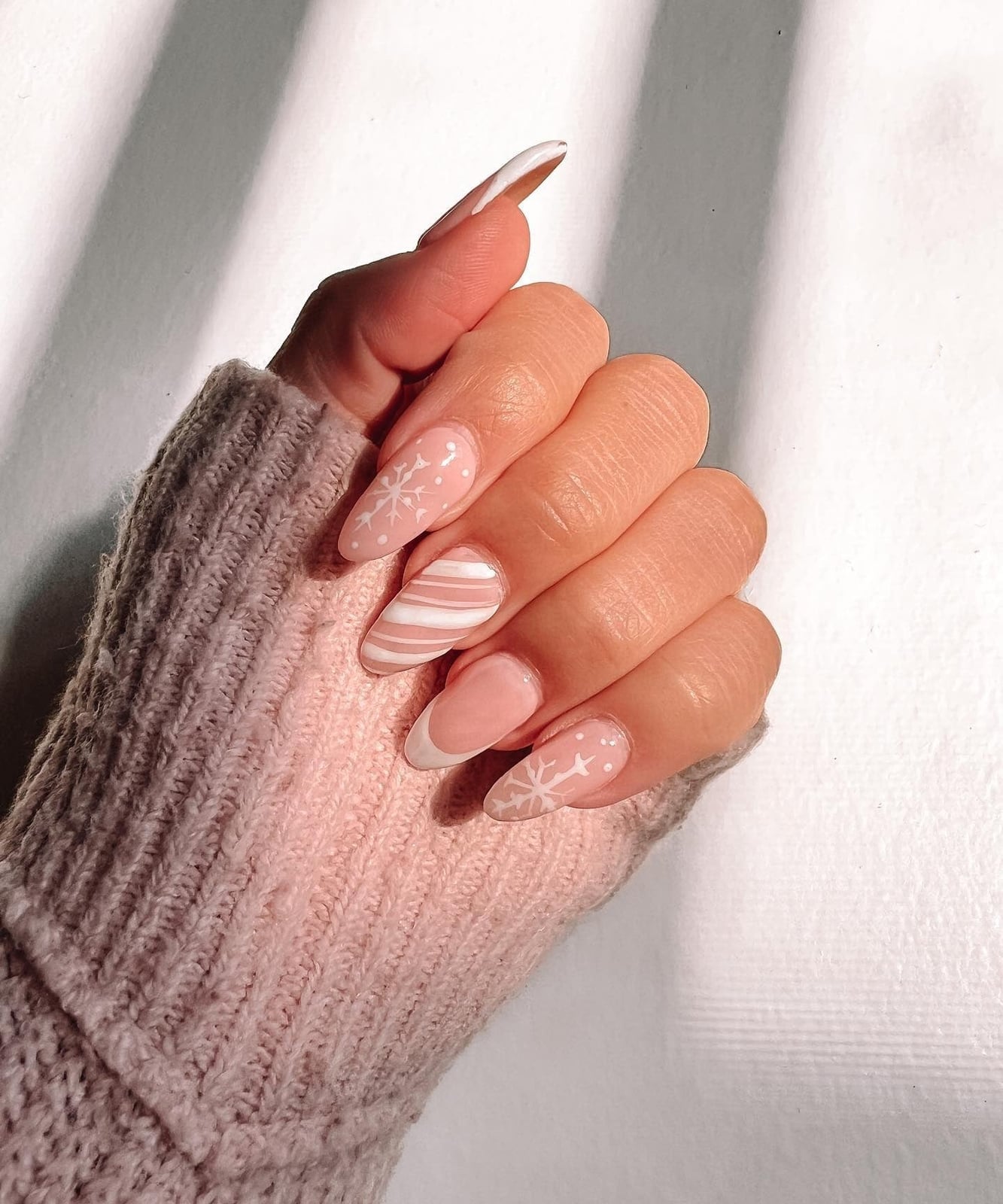 Short Almond Nails With White Snowflakes and Stripes — Winter White Nails