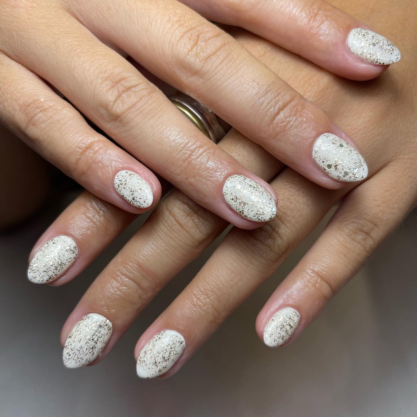 Opaque White Matte Nails With Gold Glitter Speckles — Winter White Nails