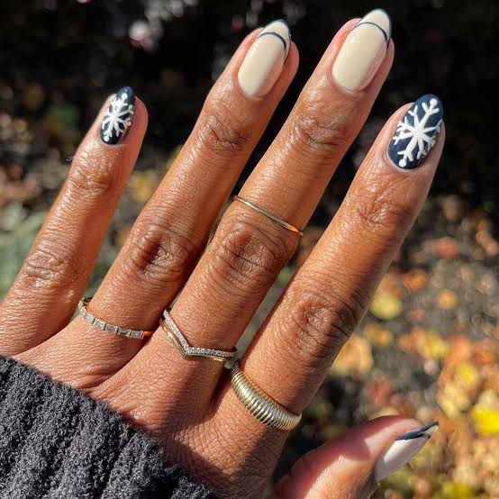 Dark Blue Almond With White Snowflakes And Cream Accents — Winter Acrylic Nails