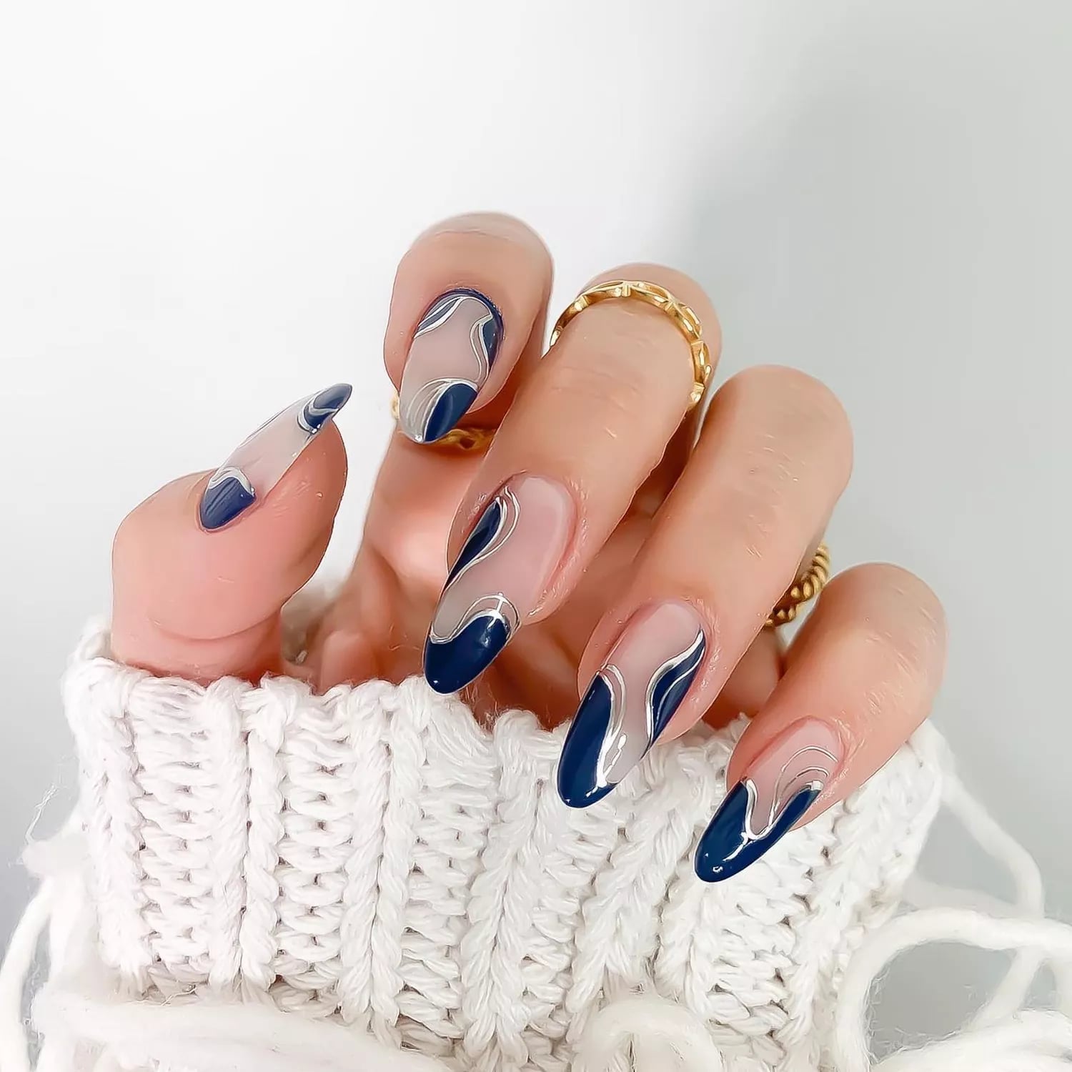 Long Almond Nude With Navy Blue Silver Wavy Lines — Winter Acrylic Nails