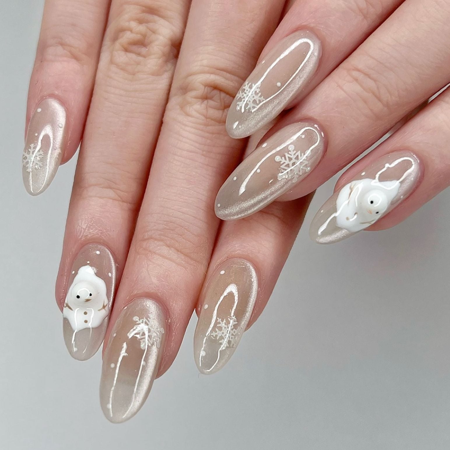 Medium Almond Nude With Snowflakes And 3D Snowmen — Winter Acrylic Nails
