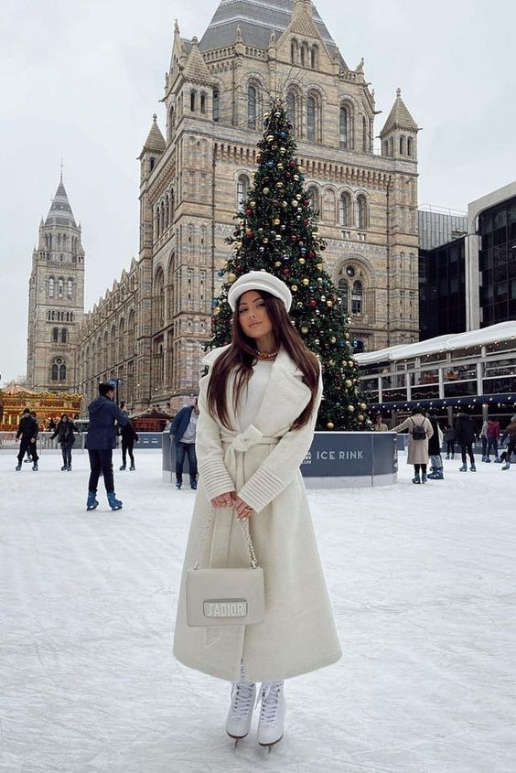 Cream tie-waist coat over knit sweater — Ice Skating Outfit