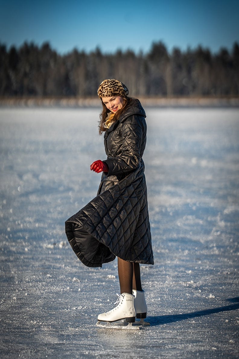 Quilted black puffer coat with leopard print hat — Ice Skating Outfit