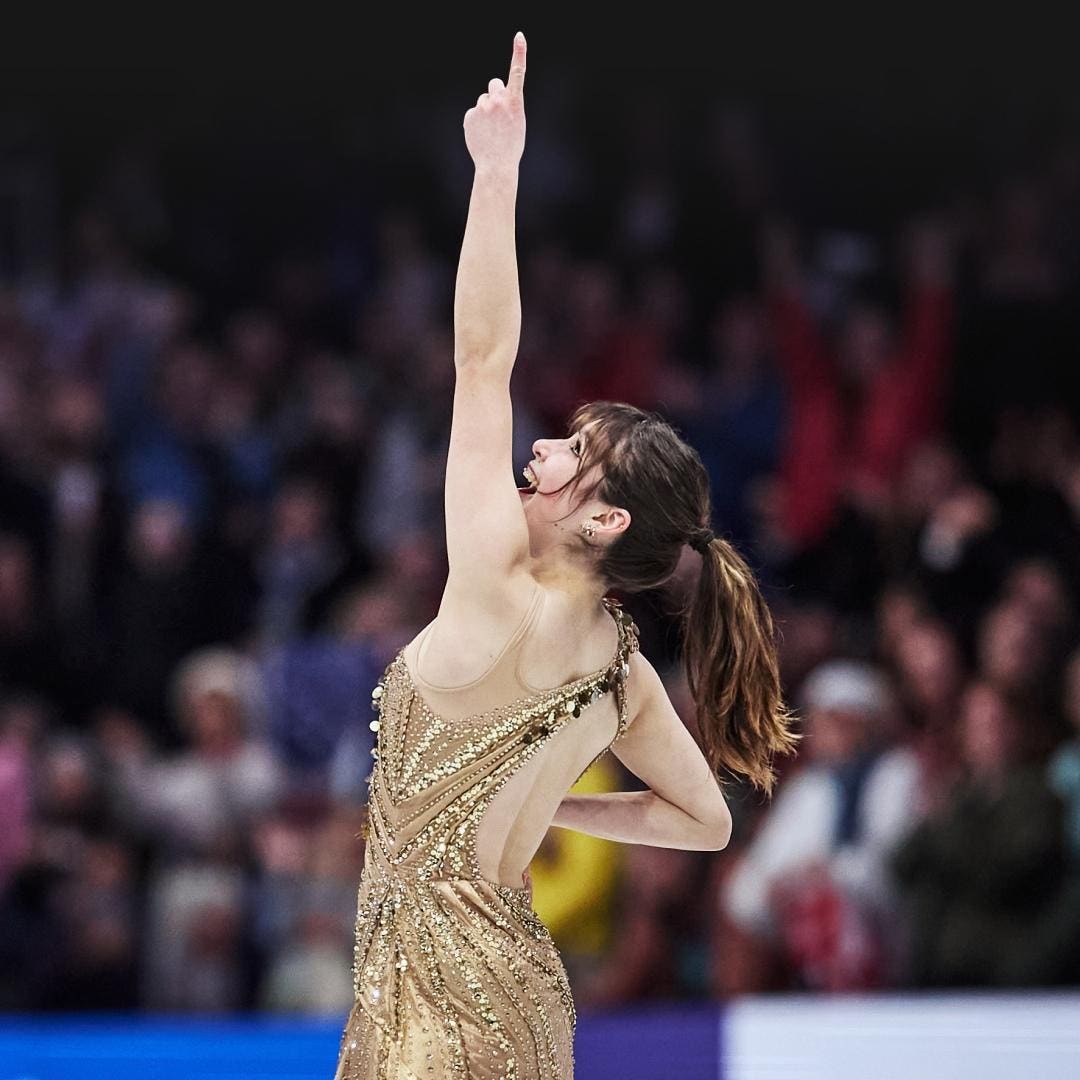 Gold sequined dress with sheer mesh panels, Close-Up Take — Ice Skating Outfit