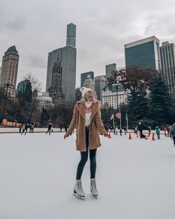 Camel faux fur coat over red and white hoodie — Ice Skating Outfit