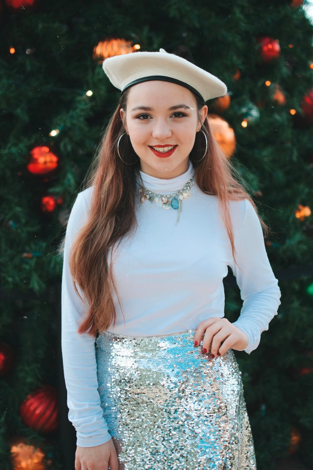 White turtleneck with silver sequin skirt and beret — Christmas Eve Outfits
