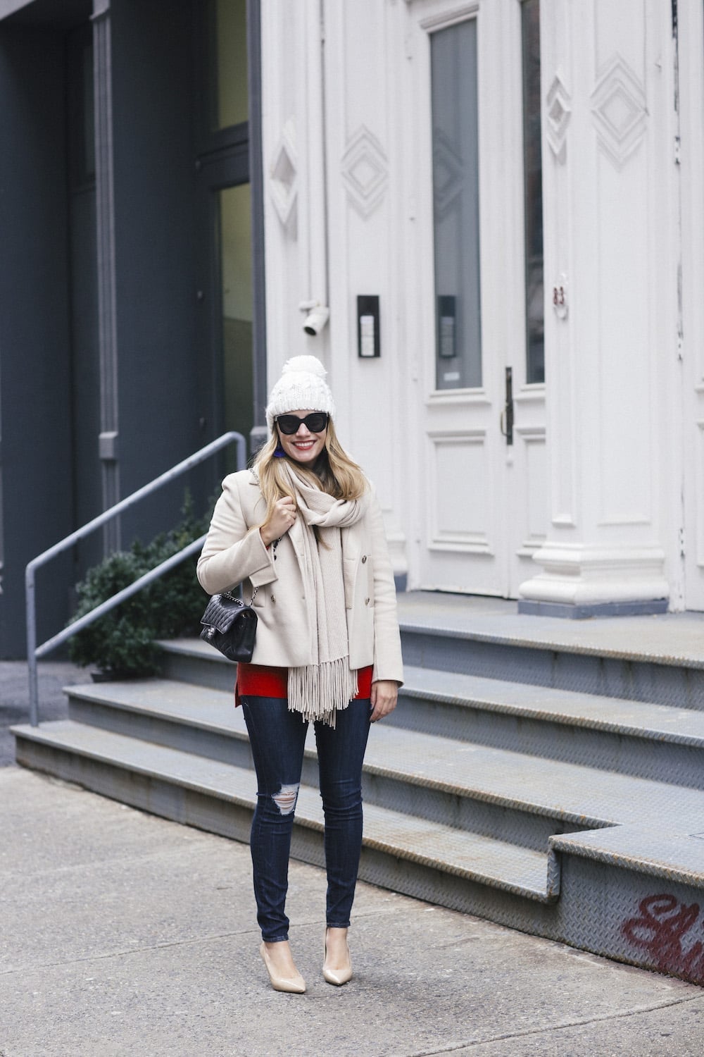 Beige wool coat over red top and skinny jeans Beige wool coat over red top and skinny jeans — Cozy Winter Outfits