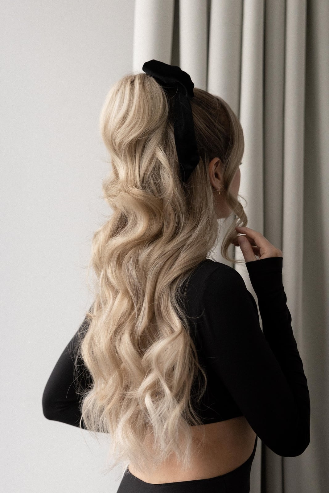 Voluminous Blowout Ponytail With Black Scrunchie Voluminous Blowout Ponytail With Black Scrunchie — Holiday Hairstyles