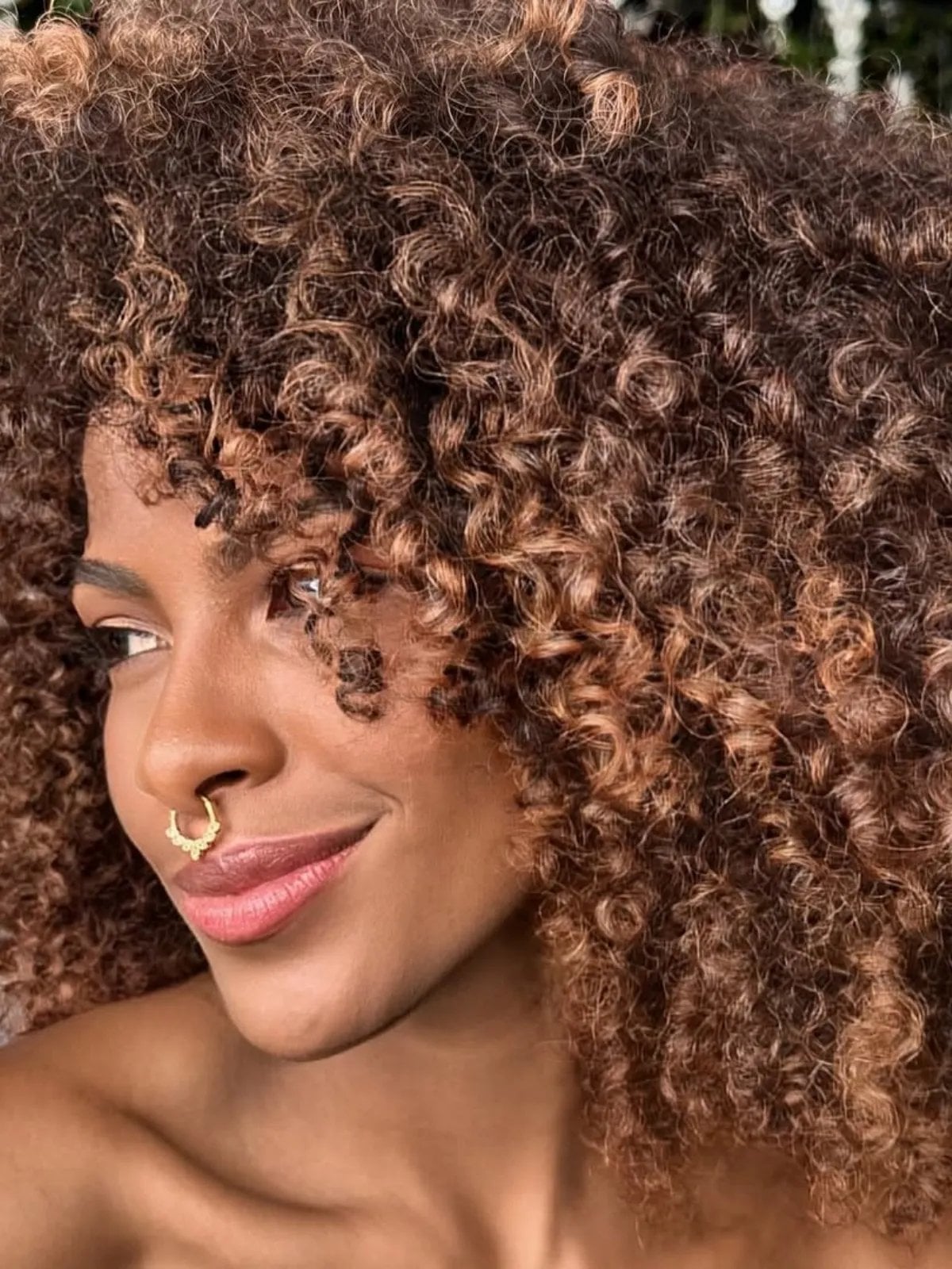 Dark Brown Curls With Caramel Balayage Close-Up — Highlight Ideas on Brown Hair