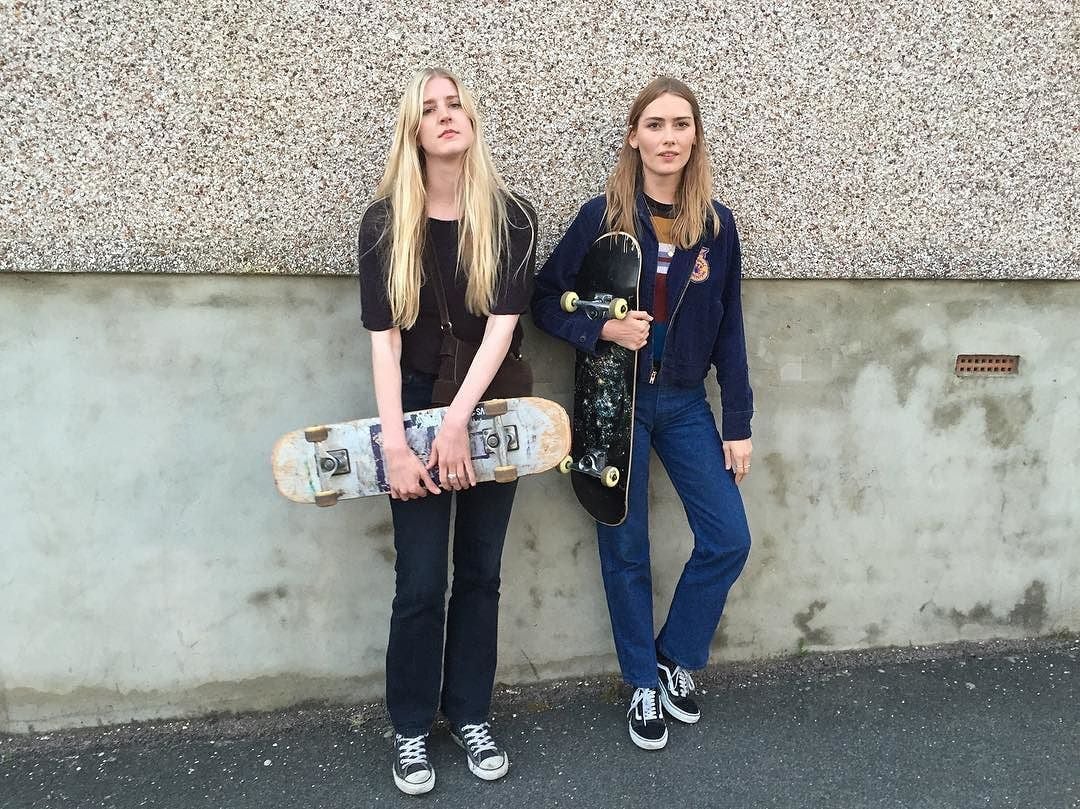 Varsity Jacket Over Striped Tee with Dark Jeans — Skater Outfits