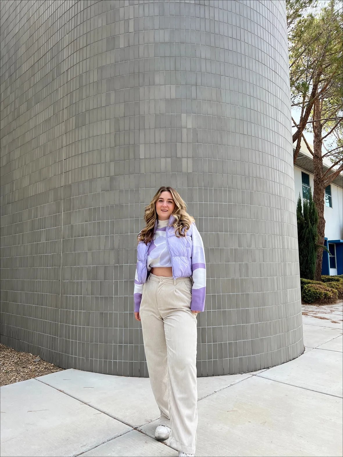 Cream Corduroy Trousers with a Striped Crop Top and Puffer Vest Cream Corduroy Trousers with a Striped Crop Top and Puffer Vest — Aesthetic White Pants Outfits